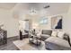 An open-plan living room with a modern design, a couch, and a rug on the floor at 1901 S Adams St, Denver, CO 80210
