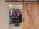 Large walk-in closet with ample shelving and hanging space at 8932 Tuscany Ln, Highlands Ranch, CO 80130