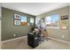 Spacious home office with a desk and ample natural light at 8932 Tuscany Ln, Highlands Ranch, CO 80130