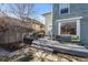Relaxing backyard deck with seating, grill, and outdoor dining, perfect for entertaining guests with easy access to the home's interior at 728 N Ogden St, Denver, CO 80218