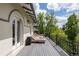 Outdoor deck with lounge chairs, a black railing, offering an inviting space to enjoy the view at 728 N Ogden St, Denver, CO 80218