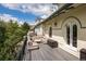 Outdoor deck featuring comfortable lounge seating, a black railing and a view of the surrounding landscape at 728 N Ogden St, Denver, CO 80218