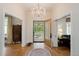 Elegant foyer with a chandelier and an ornate front door at 728 N Ogden St, Denver, CO 80218