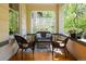 Inviting porch with comfortable wicker seating, perfect for relaxing outdoors at 728 N Ogden St, Denver, CO 80218