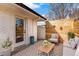Charming outdoor patio featuring a modern wooden fence and cozy seating area at 3437 N Jackson St, Denver, CO 80205
