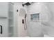 Bright walk-in shower with glass door and custom tile at 3437 N Jackson St, Denver, CO 80205