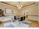 Dining room with contemporary table, chairs, area rug and chandelier at 1220 Scarsbrook Ct, Monument, CO 80132