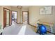 Bright hallway with multiple doorways, leading to different areas of the house and upstairs at 1220 Scarsbrook Ct, Monument, CO 80132