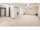 Finished basement featuring carpeted flooring and white walls and a step up at 438 N 11Th Ave, Brighton, CO 80601