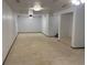 Spacious basement area with wall-to-wall carpeting and ceiling fans at 438 N 11Th Ave, Brighton, CO 80601