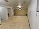 Spacious basement area with wall-to-wall carpeting and ceiling fans at 438 N 11Th Ave, Brighton, CO 80601