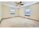 Bedroom with neutral walls, carpeted floor, a ceiling fan, and windows providing natural light at 438 N 11Th Ave, Brighton, CO 80601