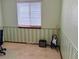 Nice bedroom with chair rail accents and a window at 438 N 11Th Ave, Brighton, CO 80601