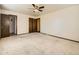 Spacious bedroom featuring neutral walls, carpeted floor, and a ceiling fan at 438 N 11Th Ave, Brighton, CO 80601