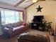 Inviting living room featuring a comfortable leather sofa, TV, and a cozy atmosphere at 438 N 11Th Ave, Brighton, CO 80601