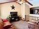 Inviting living room featuring a comfortable leather sofa, TV, and a cozy atmosphere at 438 N 11Th Ave, Brighton, CO 80601