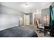 This bedroom with large closet, carpet and neutral paint provides a serene and comfortable space at 8624 Mariposa St, Thornton, CO 80260