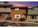 Charming townhome with brick facade and well-maintained landscaping at 8624 Mariposa St, Thornton, CO 80260