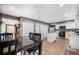 Spacious kitchen and dining area offering an island and stainless steel appliances at 8624 Mariposa St, Thornton, CO 80260
