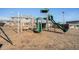 Well-maintained community playground features multiple slides and other equipment at 8624 Mariposa St, Thornton, CO 80260