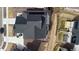 Overhead view of home, highlighting the dark roof, landscaping, and outdoor space in a suburban setting at 17233 W 93Rd Pl, Arvada, CO 80007