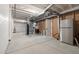 Unfinished basement space, ready to be customized, with visible utilities and ample storage at 17233 W 93Rd Pl, Arvada, CO 80007