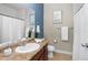 Clean bathroom with a vanity, mirror, and neutral color scheme, providing a functional and well-maintained space at 20293 E Shady Ridge Rd, Parker, CO 80134