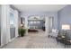 Open floor plan with light blue walls and white molding leads into a bedroom at 20293 E Shady Ridge Rd, Parker, CO 80134