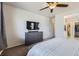 Bedroom with view of en-suite bathroom and walk-in closet at 9751 Mobile St, Commerce City, CO 80022