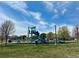 Community park featuring a playground with climbing structure, slides and swings at 9751 Mobile St, Commerce City, CO 80022