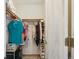 Organized walk-in closet offering ample storage space for clothes, shoes, and personal items at 1845 Kendall St # 325D, Denver, CO 80214