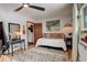 Cozy bedroom featuring a daybed, desk and modern decor at 12920 W 24Th Pl, Golden, CO 80401