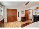 Bright bedroom with wooden floors, closet and view to the hall at 12920 W 24Th Pl, Golden, CO 80401