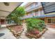 Beautiful courtyard with landscaping and a peaceful retreat at 155 S Pennsylvania St # 101, Denver, CO 80209