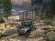 Polaris ATV parked near an observation deck at 26271 Richmond Hill Rd, Conifer, CO 80433