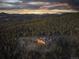 Mountaintop home with stunning sunset views at 26271 Richmond Hill Rd, Conifer, CO 80433