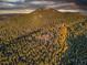 Luxury home nestled in a mountaintop forest setting at 26271 Richmond Hill Rd, Conifer, CO 80433