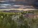 Brick home with mountain views and large lot at 26271 Richmond Hill Rd, Conifer, CO 80433