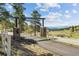 Private gated entrance to Saddle Mountain Ranch community at 26271 Richmond Hill Rd, Conifer, CO 80433