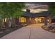 Brick home with covered entryway and landscaped grounds at 26271 Richmond Hill Rd, Conifer, CO 80433