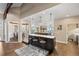 Open concept kitchen with island and breakfast bar at 26271 Richmond Hill Rd, Conifer, CO 80433