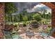Relaxing patio oasis with water feature and mountain views at 26271 Richmond Hill Rd, Conifer, CO 80433