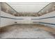 Bright and spacious workshop interior with ample storage and workbenches at 26271 Richmond Hill Rd, Conifer, CO 80433