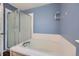 The primary bathroom includes a soaking tub and glass shower at 3532 Morning Glory Dr, Castle Rock, CO 80109