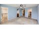 The primary bedroom boasts multiple closets, ceiling fan, and en suite bathroom access at 3532 Morning Glory Dr, Castle Rock, CO 80109