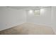 Finished basement with neutral carpet and a single window for natural light at 272 S 22Nd Ave, Brighton, CO 80601