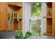 Bright kitchen window with wood shelving and potted plants at 272 S 22Nd Ave, Brighton, CO 80601