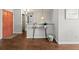 Inviting living room with a modern table and a vibrant orange front door at 272 S 22Nd Ave, Brighton, CO 80601