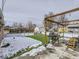 Backyard with pergola, grill, and artificial turf at 1333 Hanover St, Aurora, CO 80010