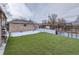 Artificial turf backyard with storage shed at 1333 Hanover St, Aurora, CO 80010